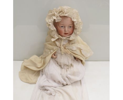 An Einco 2 German bisque headed girl doll, 13" tall, fingers missing