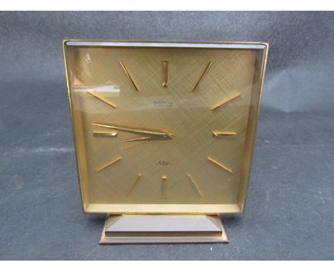 A Looping 15 jewel lever 8 day antimagnetic brass cased desk clock, circa 1970's, 12.5cm high