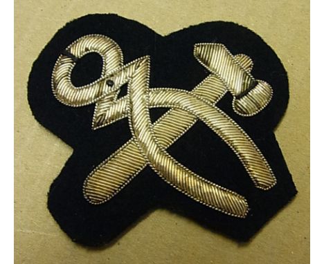 British Army Mechanic/ Artificer vintage cloth patch, in silver braid black cloth