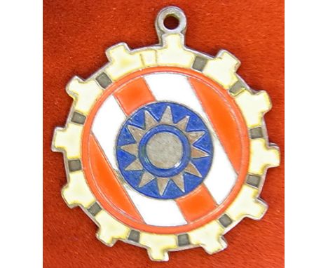 Chinese Nationalist (Taiwan), yellow, white, red and blue enamel medal in the shape of a gear. Scarce