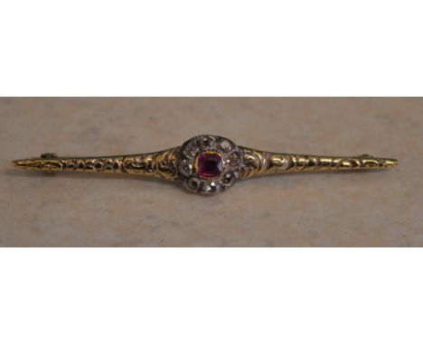 Tested as 18ct gold diamond and ruby bar brooch, total approx weight 4.57g