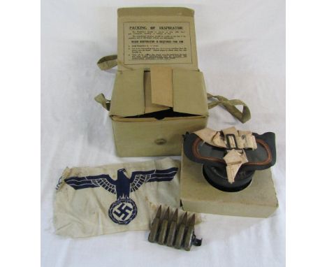 Child's gas mask, shells and a Kriegsmarine sports shirt patch