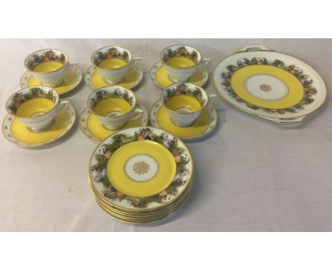 Yellow ground &amp; figural half tea service comprising cups, saucers, sandwich plates &amp; dish