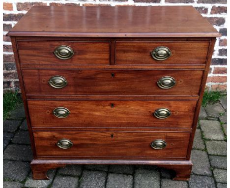 Georgian mahogany chest of drawers on bracket feet with replacement plate handles