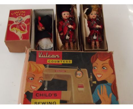 Various vintage dolls to include a Vulcan child's typewriter 