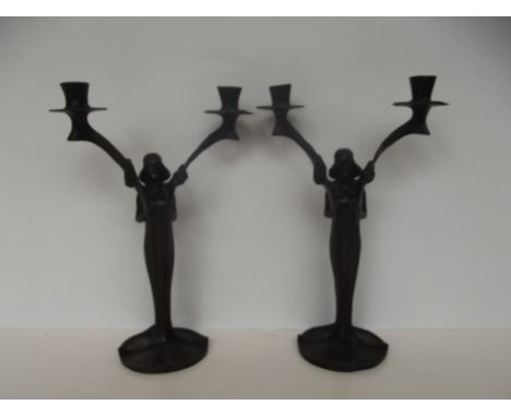 Pair of bronze art nouveau candelabras, height 34cm