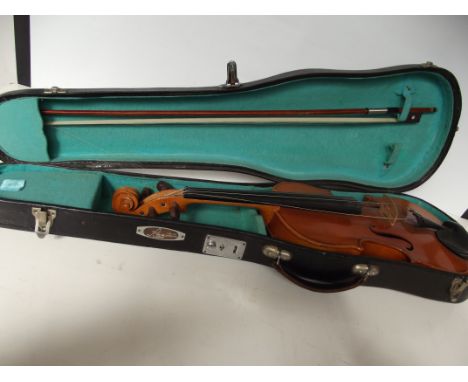 Cased violin with bow