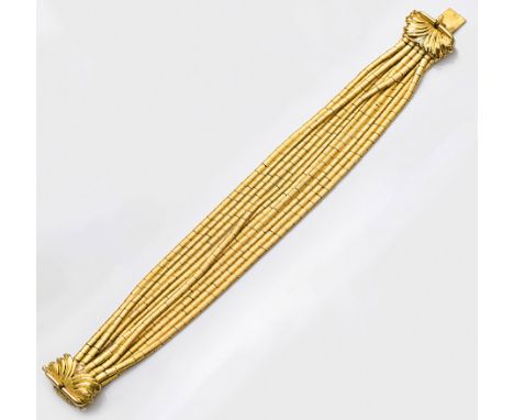 Cocktail-Armband der 1950er Jahre Neapel. Gelbgold, gest. 750. 11 Stränge aus mattierten, zylinderförmigen Gliedern. Vegetabi