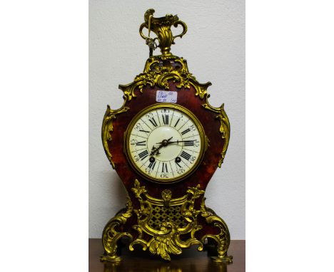 FRENCH GILT AND BRASS MOUNTED TORTOISE SHELL MANTLE CLOCK. A & N OF PARIS