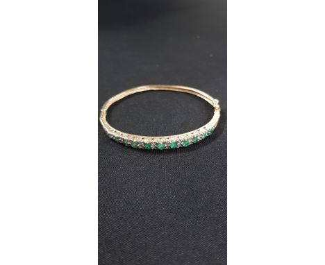 9CT GOLD EMERALD AND DIAMOND BANGLE TOTAL WEIGHT 10.7G