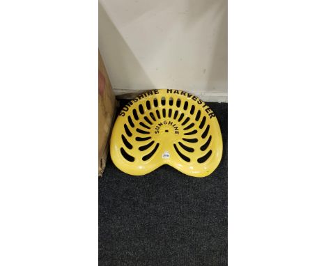 YELLOW TRACTOR SEAT