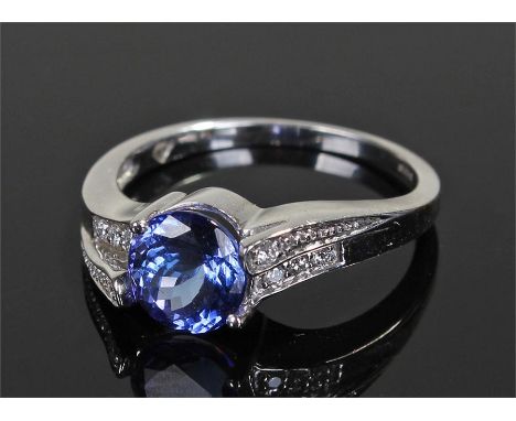 9 carat white gold zircon ring, the round cut zircon with stepped shoulders, ring size N 1/2
