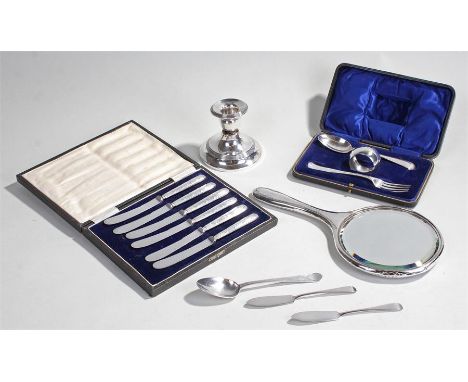 Collection of silver, to include two silver butter knives, a candlestick (AF),  a Victorian dessert spoon, a cased silver fru