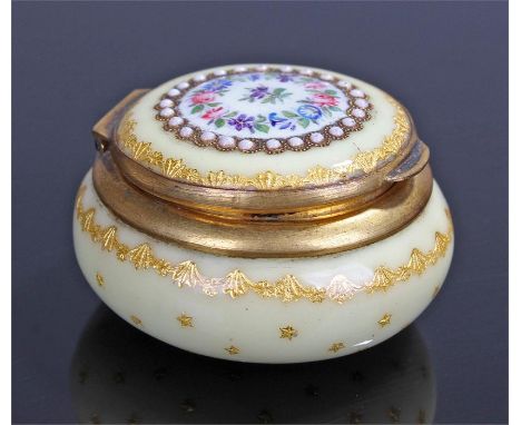 19th Century enamel and gilt metal box, the hinged lid with flowers decorated to a white ground above a yellow ground decorat