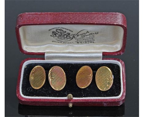 Pair of 9 carat gold cufflinks, with engine turned decoration and swag edge, 6.1 grams, cased