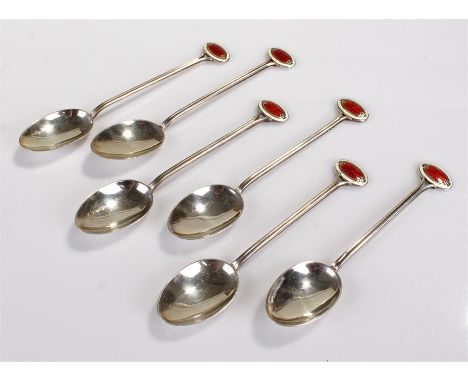 Six Art Deco silver and enamel coffee spoons, Birmingham 1932, James Fenton, the oval finials decorated with guilloche enamel