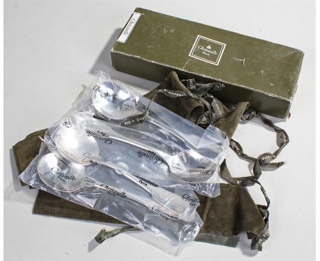 Christofle sterling silver set of four spoons, fiddle pattern, each within leather wallets and boxed, 8oz in total (4)
