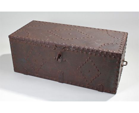 Unusual German 18th Century strong box, the stud and iron top encasing a pine trunk, a trapezoid steel and iron key, the box 