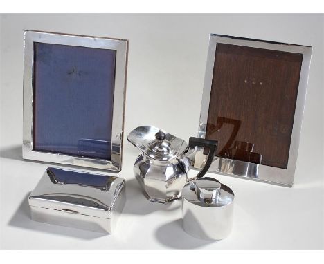 Silver objects, to include a silver tea caddy, a silver lidded jug, a cigar box and two silver frames, (5)