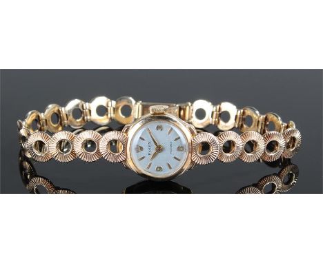 Rolex ladies 9 carat gold wristwatch, the signed silvered dial with baton and Arabic hours, manual wound with original Rolex 