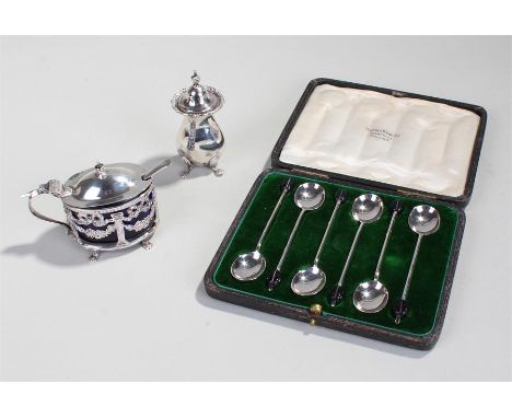 Collection of silver, to include a silver mustard and matched silver spoon, a silver pepper and a set of silver cased coffee 