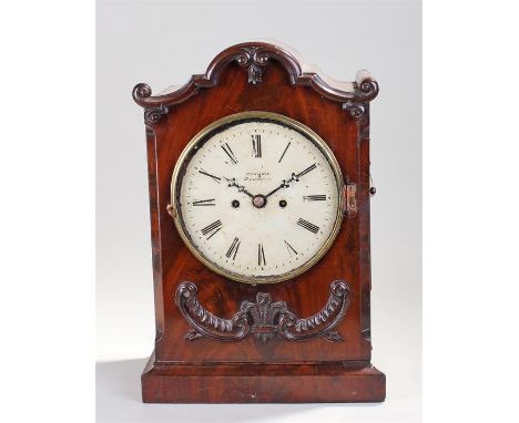 Victorian mahogany bracket clock, Corken Oswestry, the arched top above a fleur de lis to the base, the signed white paitned 