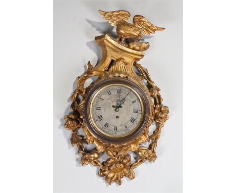 George III gilt gesso cartel clock, Robert Manley of London, circa 1775, the eagle finial with outspread wings standing upon 