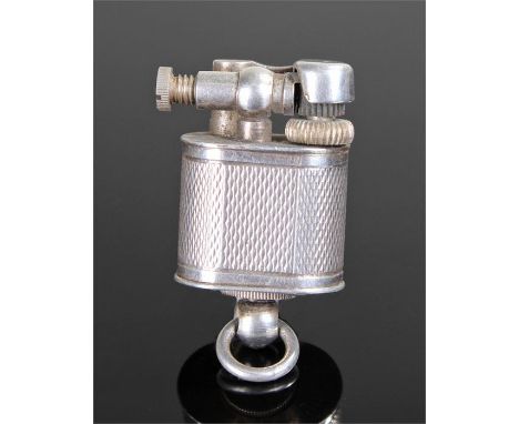 Dunhill `Baby Sylph` Miniature Cigarette Lighter, the silver plated body with lift-arm and hatched body, link to the base, 35