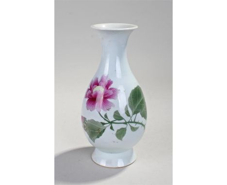 Chinese flower vase, decorated with a pink flower and green stalk with leaves, dual blue ring mark to the base, 26cm high
