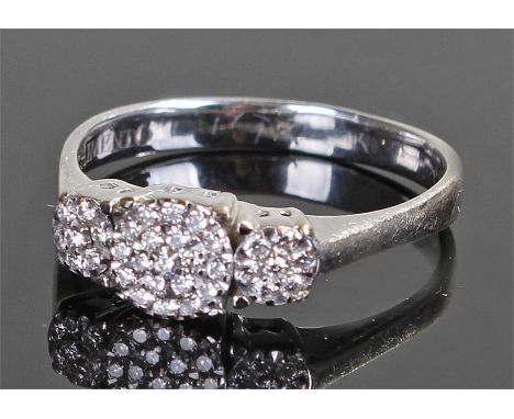 Chimento 18 carat white gold diamond set ring, set with a circular diamond head, flanked by diamond set shoulders, ring size 