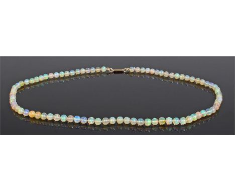 Opal necklace, with a row of opal spheres and a gold clasp end, 48cm long