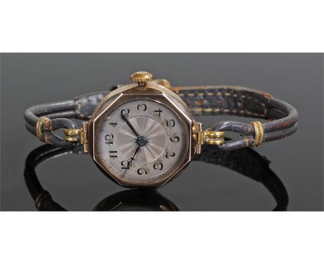 Ladies 9 carat gold wristwatch, the silvered dial with Arabic hours, angled case, manual wound, case 24mm diameter 