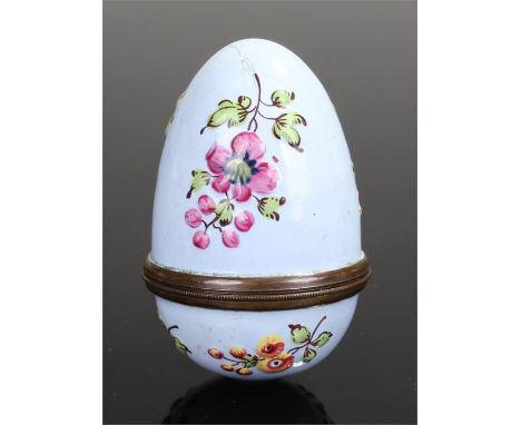 Bilston enamel nutmeg grater, circa 1770, of ovoid shape and decorated in relief with floral sprays on a pale blue ground.  C