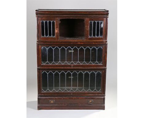 Globe Wernicke sectional oak bookcase, the rectangular top above a cabinet top section and two astragal glazed sections and d