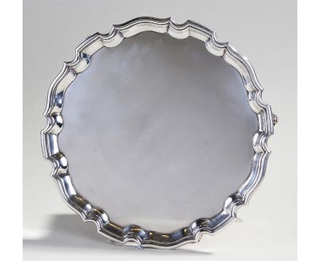 George V silver salver, Sheffield 1922, maker Harrison Brothers & Howson, with gadrooned rim raised on three scrolled feet, 2