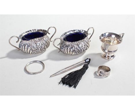 Collection of silver items, to include two silver salts with blue glass liners, a silver cup, a silver belt ring, a ring and 