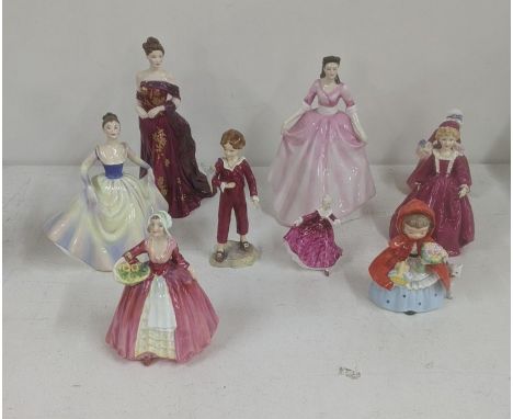 A group of Royal Doulton figures to include 'Gloria' and others, Royal Worcester examples to include 'Zoe' figure of the year