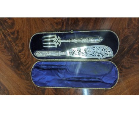 A Victorian silver fish serving set to include a fish slice having pierced and engraved design and a floral embossed handle, 