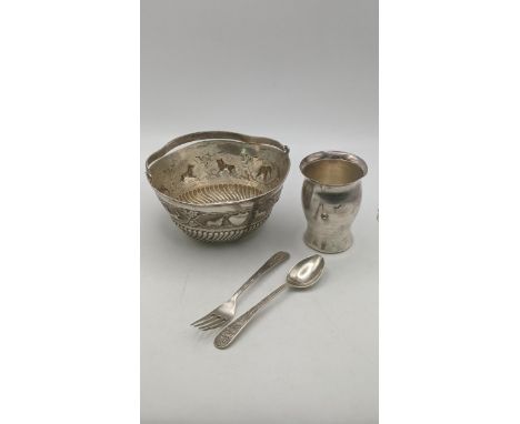 Sterling silver and white metal items to include a decorative basket with embossed animals out in the wild along with a small