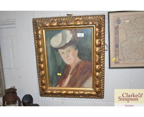 An early 20th Century portrait study of a lady, initialled E.M. in decorative gilt frame 