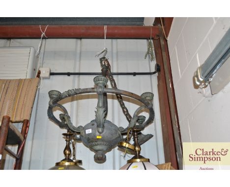 A brass six light chandelier 