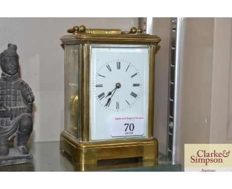 A brass cased carriage clock 