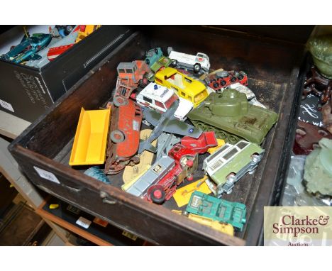 A box of various die-cast toys to include Dinky examples