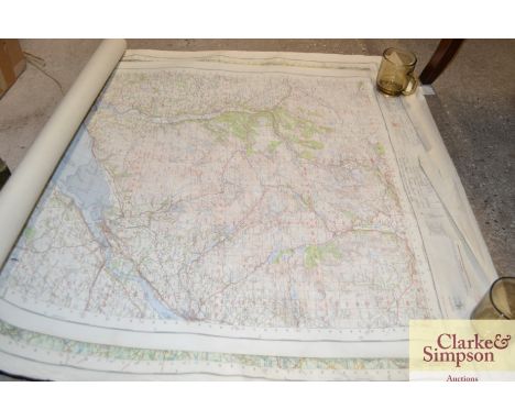 A quantity of rolled Ordnance Survey maps 