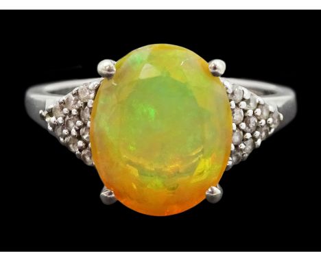 9ct white gold opal and cubic zirconia cluster ring, hallmarked Condition Report:Approx 2.7gm, size O, overall head = 11mm x 