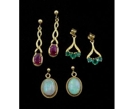 Three pairs of 9ct gold pendant stud earrings including opal, emerald and rubyCondition Report:Approx 4.25gm, tested 9ct or h