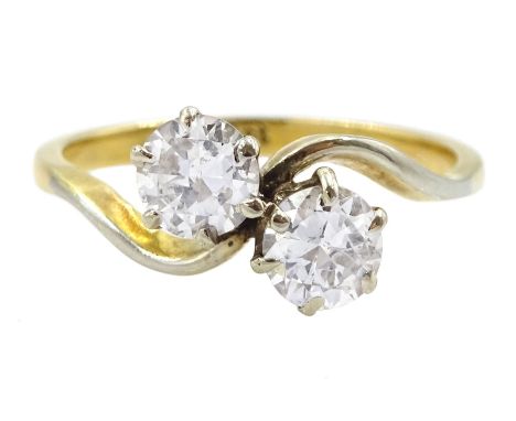 18ct gold two stone round brilliant cut diamond crossover ring, stamped, total diamond weight approx 0.75 caratCondition Repo