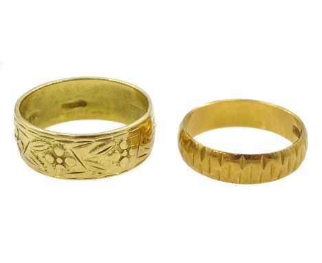 Two 18ct gold wedding bands, Birmingham 1994 and London 1969Condition Report:Approx 7.65gm, wide band size N depth = 7mm, oth