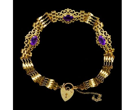 9ct gold three stone oval amethyst gate bracelet, with heart padlock clasp, stamped 375Condition Report:Approx 7.5gm, length 