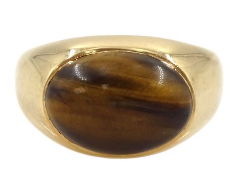 18ct gold single stone tiger's eye signet ring, stampedCondition Report:Approx 10.3gm, tested 18ct, size Q-R, had depth = 12m